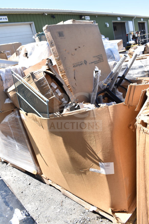 Large box containing 12 brand new scratch and dent items, including tabletop and table base columns. Exterior shows wear.