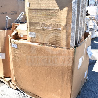 Cardboard boxes containing five new scratch and dent items, including a dunnage rack, wrapped on a pallet outdoors.