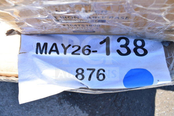 Auction lot with 8 brand new scratch and dent items, including a work table. Label reads "MAY26-138, 876."