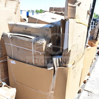 Cardboard boxes with "Lancaster" branding, containing 15 new scratch and dent items, including forks and fryer basket.