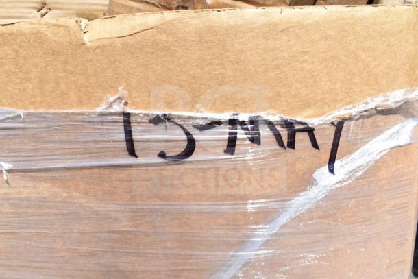 Cardboard box wrapped in plastic, labeled "13-MAY" for auction. Contains 20 new scratch and dent items, including microwave shelf and smoker box.