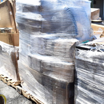 Pallet of 25 new scratch and dent items, including takeout containers, sporks, and meat trays, wrapped in plastic.