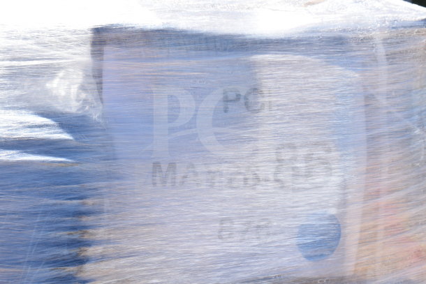 Packaged items labeled "MAY26-86." Includes 25 new scratch and dent items like takeout containers and sporks.