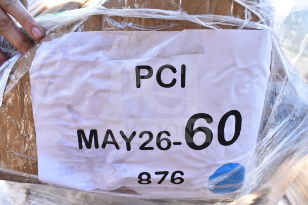 Alt text: "Labeled package with 'PCI MAY26-60' marking, wrapped in plastic indicating auction item."