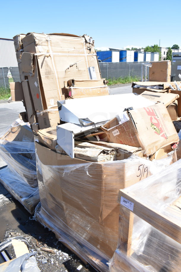 Auction lot of 15 brand new scratch and dent items, including various table parts and a faucet, all wrapped in plastic on pallets.