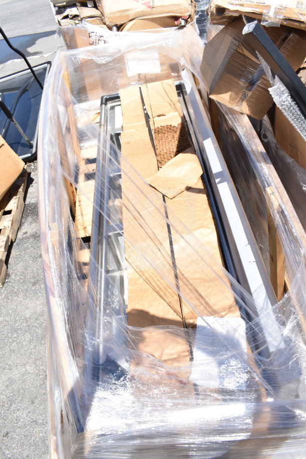 Brand new scratch and dent Regency 600S31620218 three compartment commercial sink with dual drain boards, wrapped in packaging.