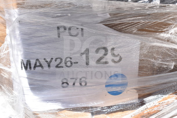 Plastic-wrapped package with label "MAY26-129" and "876." Contains 6 scratch-and-dent items including trays.