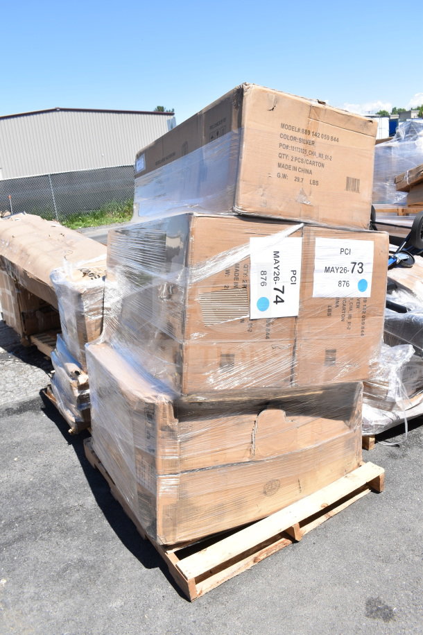 Pallet of four boxed items, new scratch and dent, labels marked MAY26-73/74, wrapped in plastic, outdoors.
