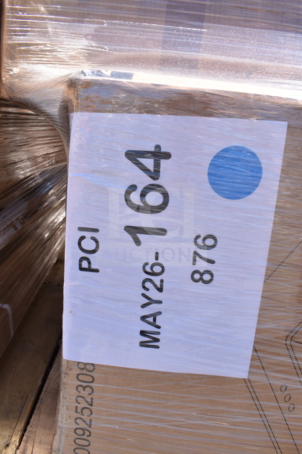 Pallet with items labeled "PCI 164, MAY26-164, 876," wrapped in plastic. Includes brand new scratch and dent chairs.