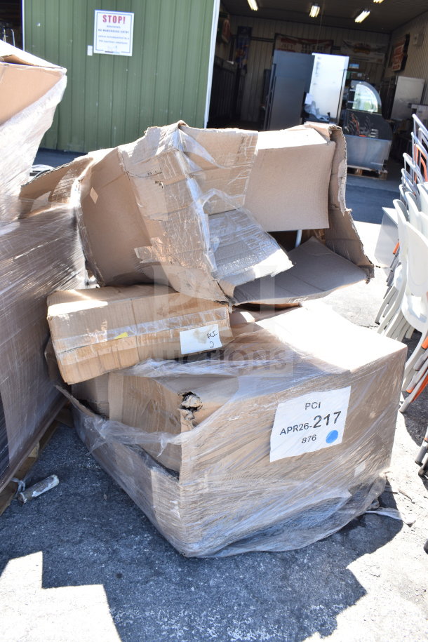 Pallet of brand new scratch and dent items in damaged boxes, including chairs. Label: PCI APR26-217 876.