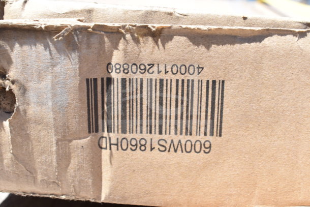 Cardboard box with barcode showing Regency 600WS1860HD, item appears packaged, suggesting new condition.