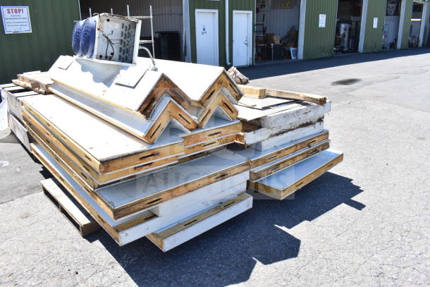Master-Bilt 8'x12' walk-in box parts on pallets, with compressor and evaporator fan, showing moderate wear.