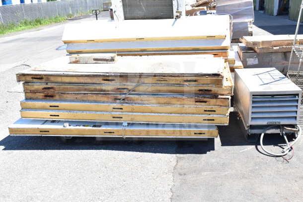 Master-Bilt 8'x12' walk-in box components with compressor and evaporator fan, showing wear.