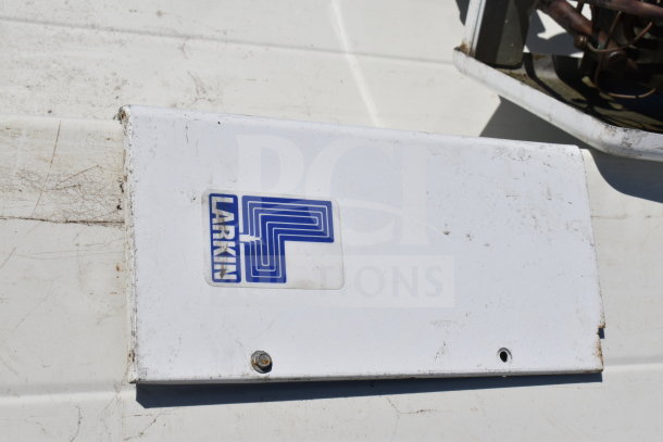Master-Bilt 8'x12' walk-in box with Larkin evaporator fan unit; shown with visible logo and mounting surface marks.