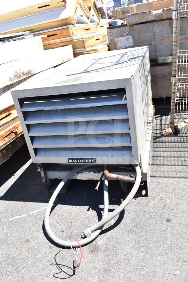 Master-Bilt compressor and evaporator fan unit, part of an 8'x12' walk-in box, shown pre-removal in outdoor setting.