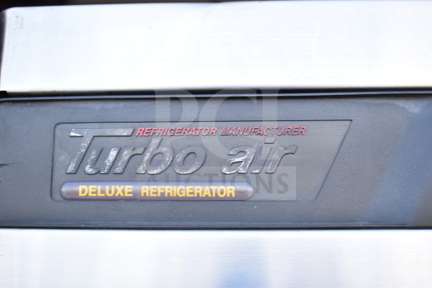 Turbo Air TSR-49SD Commercial 2 Door Reach In Cooler, label close-up showing "Turbo Air Deluxe Refrigerator".