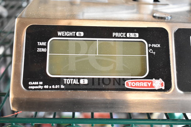 Torrey L-PC-40L commercial scale, 40 lb capacity, stainless steel, digital display, tare function, model marking visible.