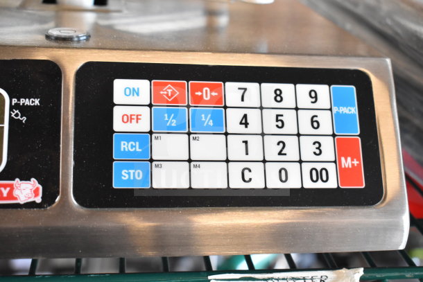 Torrey L-PC-40L commercial scale, 40 lb capacity, features keypad and weight functions. Excellent condition, stainless steel finish.