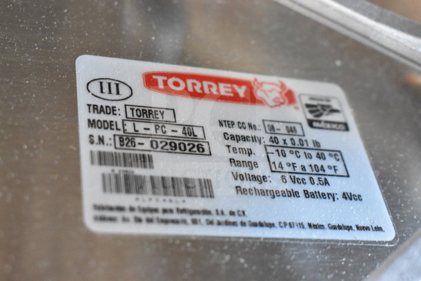 Torrey L-PC-40L scale label showing model, capacity 40 lbs, temperature range, voltage, and serial number B26-029026.