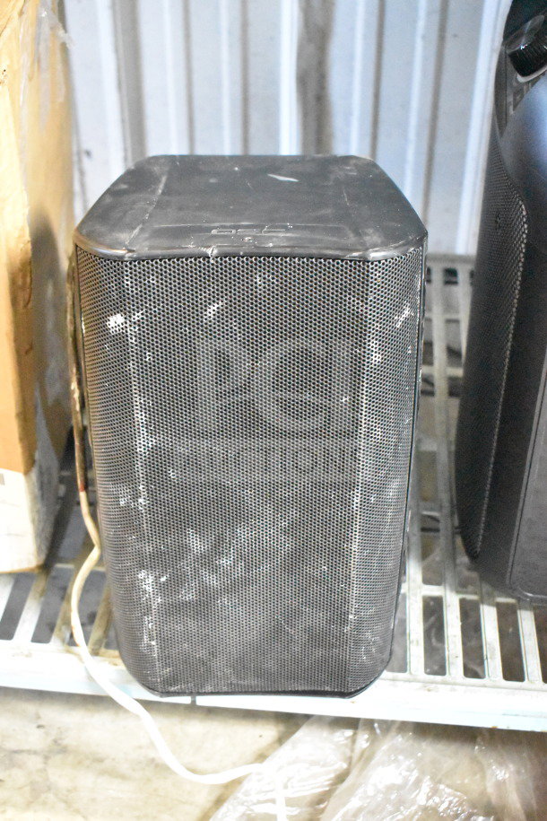 QSC AD-S6T surface mount loudspeaker with mesh grille, slightly used condition, visible scuffs, black finish.