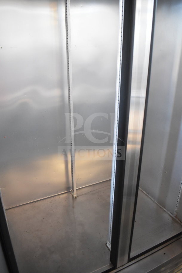 2021 True T-35-HC 2 Door Reach In Cooler, commercial casters, 115V, 1 Phase, stainless interior, good condition.