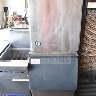 Hoshizaki Commercial Ice Head on B-300SF Ice Bin, stainless steel, minor surface wear, Hoshizaki label visible.