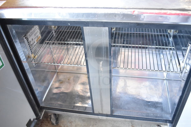 Turbo Air TUR-36SD 2 Door Undercounter Cooler, commercial casters, 115V, stainless steel, used condition.