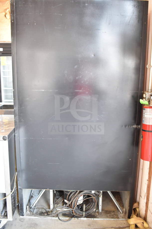 Beverage Air Commercial 2 Door Reach In Cooler, 115 Volts, 1 Phase; black exterior, visible surface wear, no markings.