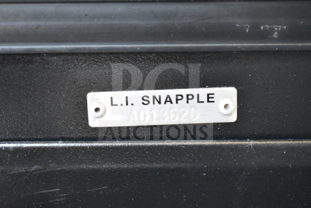 Beverage Air 2-door reach-in cooler, commercial-grade, 115 volts, 1 phase. Metal tag reads "L.I. SNAPPLE A013620".