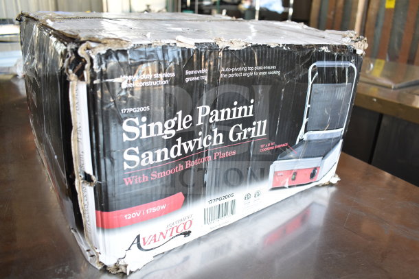 Avantco 177PG200S Panini Grill in original box with damaged packaging. Features smooth plates, 13 3/8" x 8 3/4" surface.