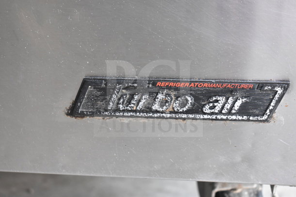 Turbo Air TST-72SD-30 label on commercial sandwich prep table, visible wear. 115V, 1 phase.