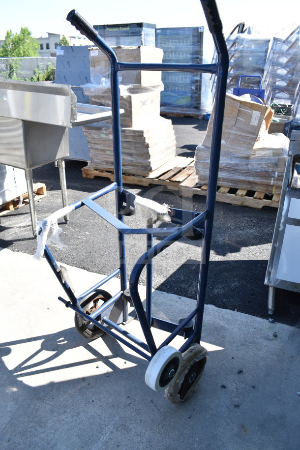Blue furniture dolly with sturdy frame, two wheels, and padded handle, in good condition. Ideal for moving heavy items.