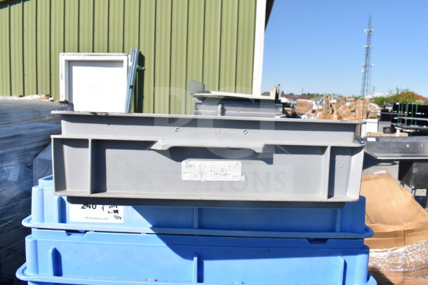 Stacked blue poly dough bins and other items in an outdoor setting, indicating bulk sale of 40 mixed items.