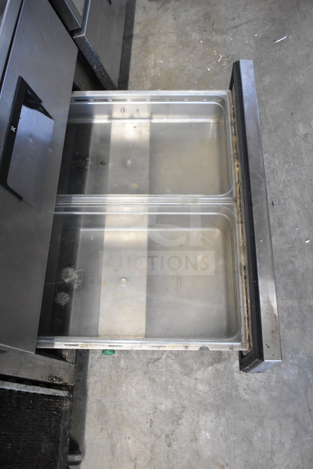 Everest Commercial 4 Drawer Chef Base on casters, one drawer open, showing stainless-steel interior, 115V, 1 phase.