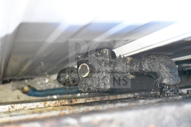 Radiance Commercial 6 Burner Gas Range, countertop model. Visible wear and signs of use; key components close-up.