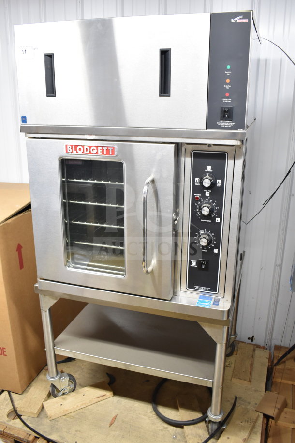 Brand new 2021 Blodgett CTB-1 half-size convection oven with VLH hood, on commercial casters. Scratch and dent condition.