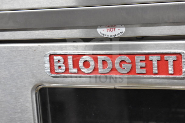 Brand new Blodgett CTB-1 half size convection oven with VLH hood. Includes "Caution Hot" label. Electric, 208-240V.