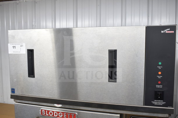Brand new Blodgett CTB-1 convection oven with VLH hood. Electric, half-size, scratch and dent, on commercial casters.