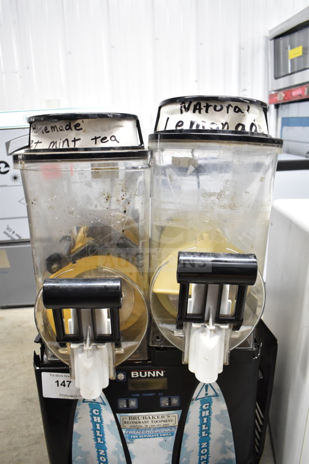 Bunn Ultra-2 Commercial Slushie Machine, 120V, 1 Phase. Dual transparent tanks, labeled "Sweet Mint Tea" and "Natural Lemonade."