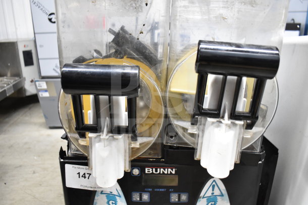 Bunn Ultra 2 commercial countertop slushie machine, 120 volts, 1 phase, tested and working, dual translucent tanks, black handles.