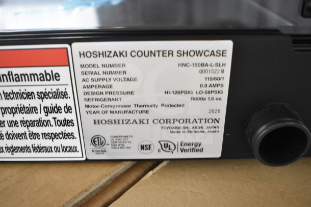 Brand new 2025 Hoshizaki HNC-150BA sushi display case, 115V, 1 phase. Label shows model, voltage, and certifications.