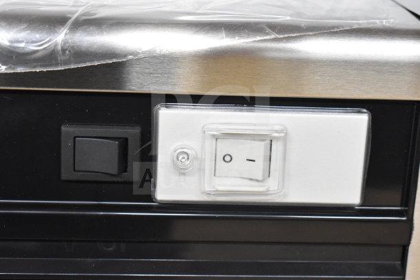 "2025 Hoshizaki HNC-150BA sushi display close-up, showing power switches and stainless steel finish. 115V, 1 Phase."