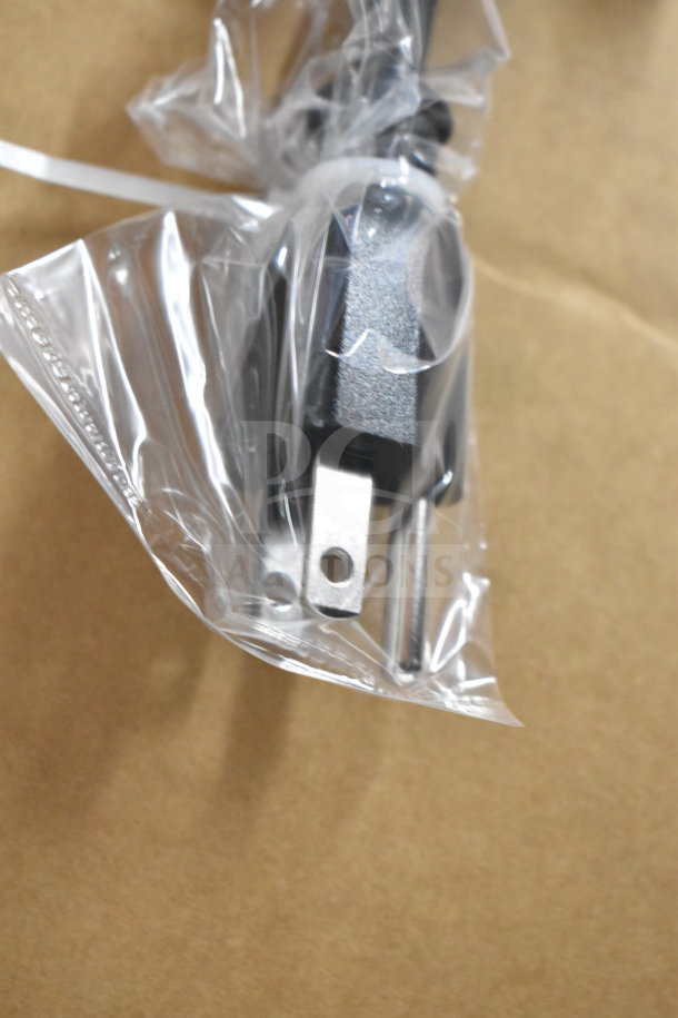 Plug of a 2025 Hoshizaki HNC-150BA commercial sushi display case, wrapped in plastic packaging.