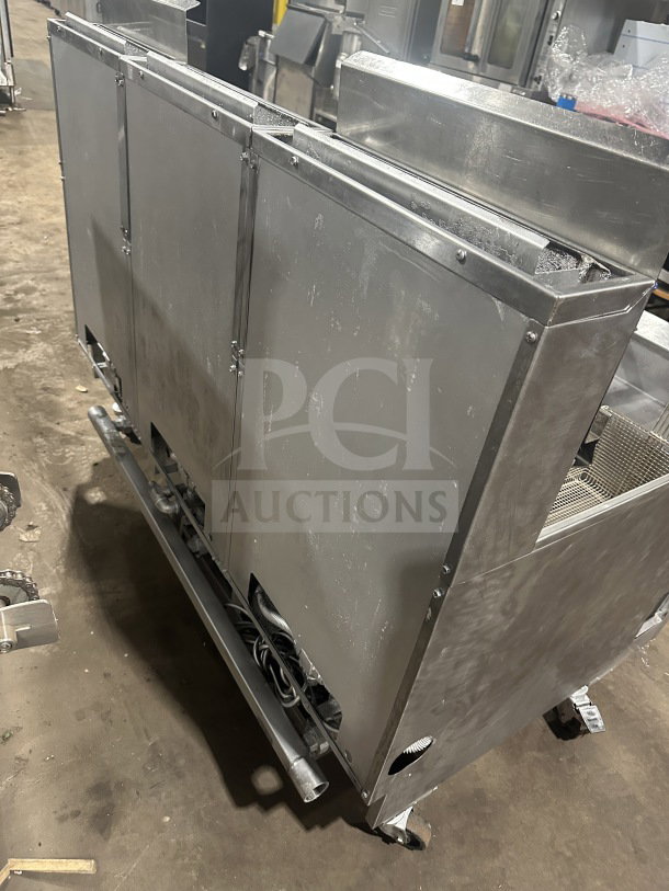 Pitco Solstice Supreme Series commercial triple bay fryer, model SSH75, stainless steel, on casters, 115V, natural gas powered.