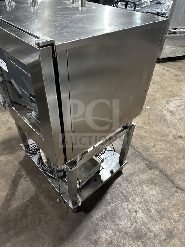 Angelo Po commercial stainless steel combi oven with digital controls, model FX61G3UKX02, on single undershelf stand.