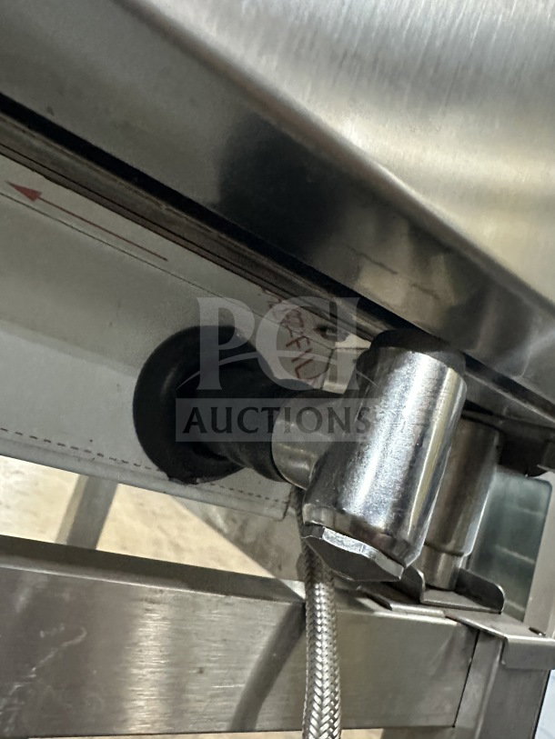 Angelo Po Combi Oven, model FX61G3UKX02, stainless steel, natural gas, digital controls, wired rack, on legs.