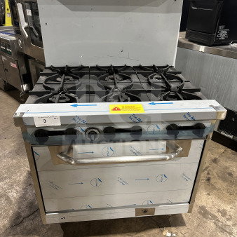 Brand new Kutano 36" 6-burner stainless steel range/oven, natural gas, model KUT6BRN36N6, with wired oven rack, on legs.
