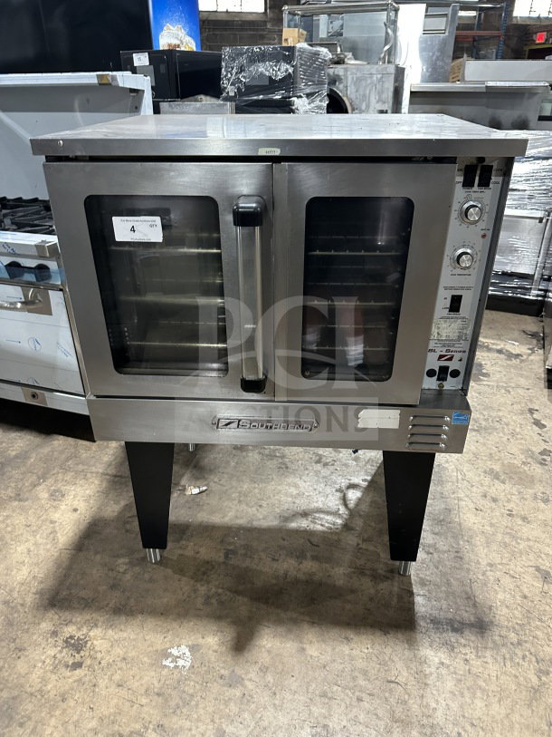 Southbend stainless steel gas convection oven, Energy Star certified, with thermostatic controls, wired oven rack, and sturdy legs.