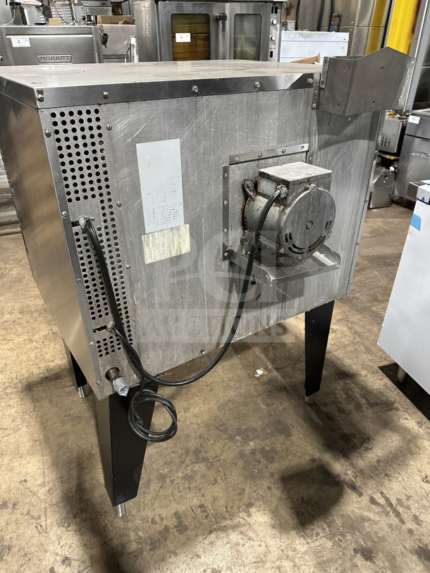 Southbend stainless steel gas convection oven, single stack, on legs, Energy Star certified, with thermostatic controls and rack.