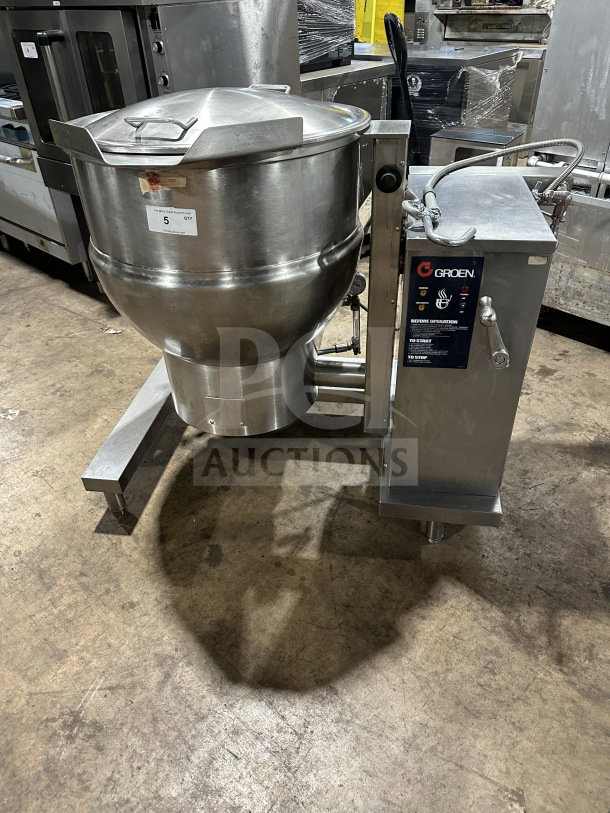 Groen DH140 40 gal. commercial stainless steel tilting steam kettle, natural gas, 120V, 1 phase. Silver, on legs.